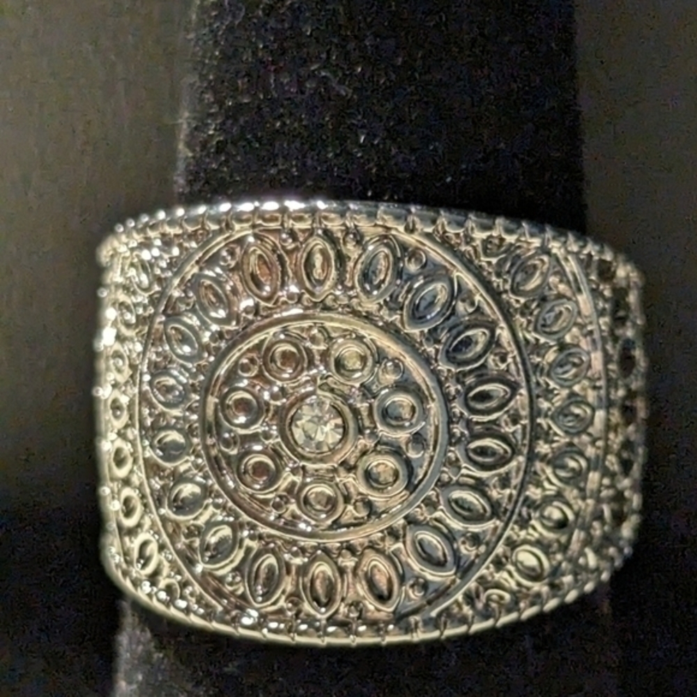 Large metal ring approximately 8.5.NWOT